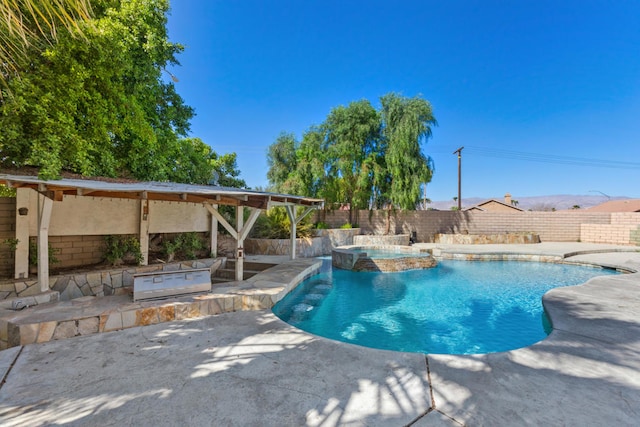 view of pool with a patio area and a gazebo