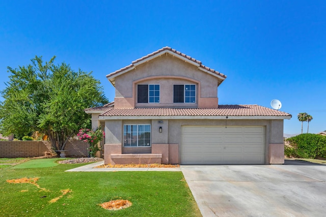 view of front of home with a garage and a front lawn