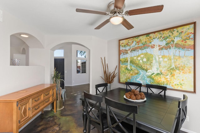 dining area with ceiling fan