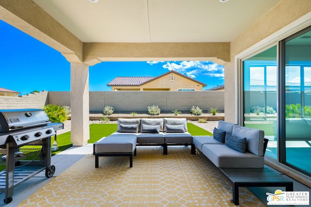 view of patio / terrace featuring area for grilling and outdoor lounge area