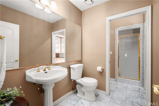bathroom featuring baseboards, visible vents, marble finish floor, and a stall shower