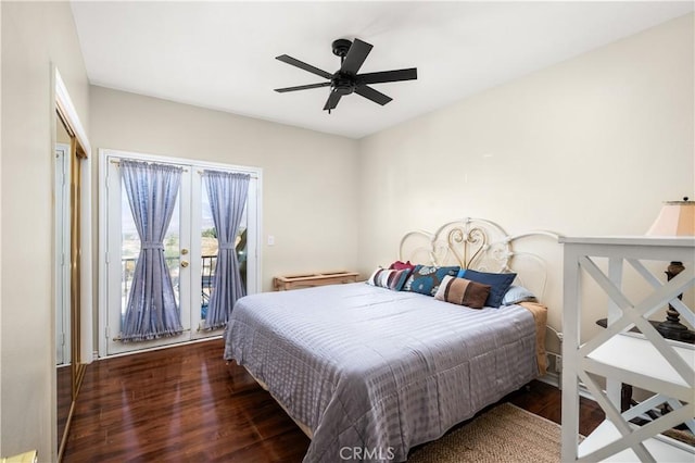 bedroom with ceiling fan, wood finished floors, and access to exterior