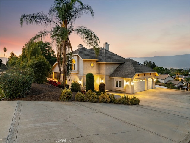 view of front of home with a garage