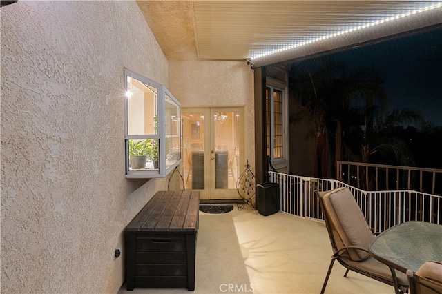 balcony featuring french doors and a patio