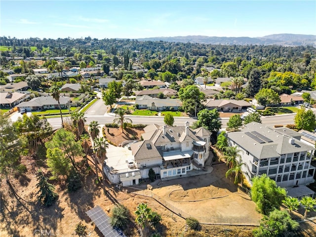 drone / aerial view featuring a mountain view