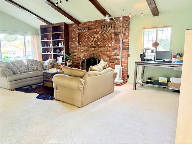 carpeted living area with vaulted ceiling with beams and a brick fireplace