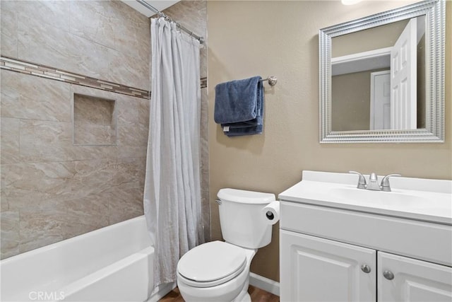 full bathroom with toilet, vanity, and shower / tub combo with curtain