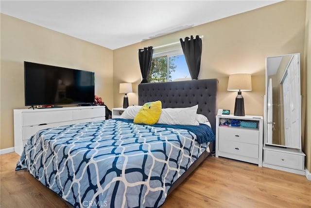 bedroom featuring light hardwood / wood-style floors