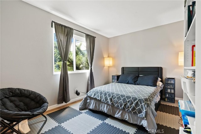 bedroom featuring hardwood / wood-style floors