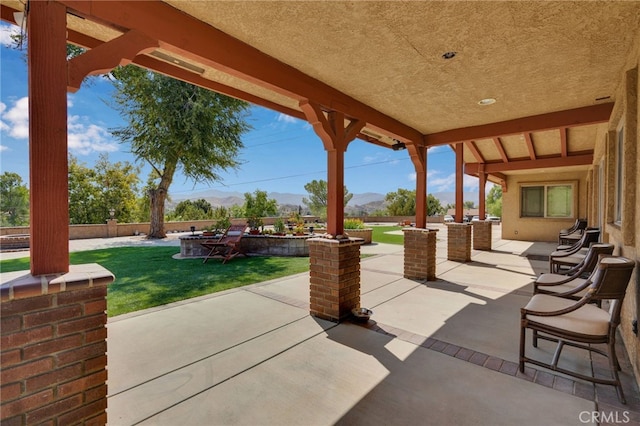 view of patio with a mountain view