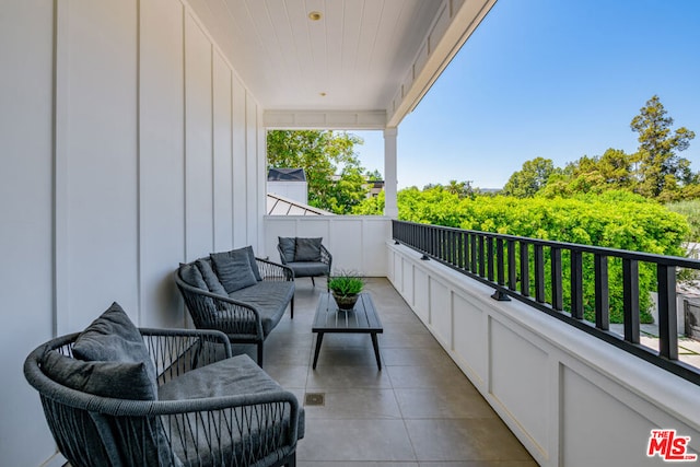 balcony featuring an outdoor living space