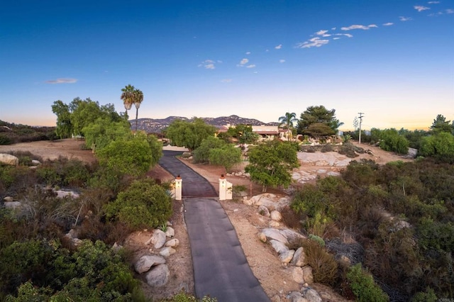 exterior space featuring a mountain view