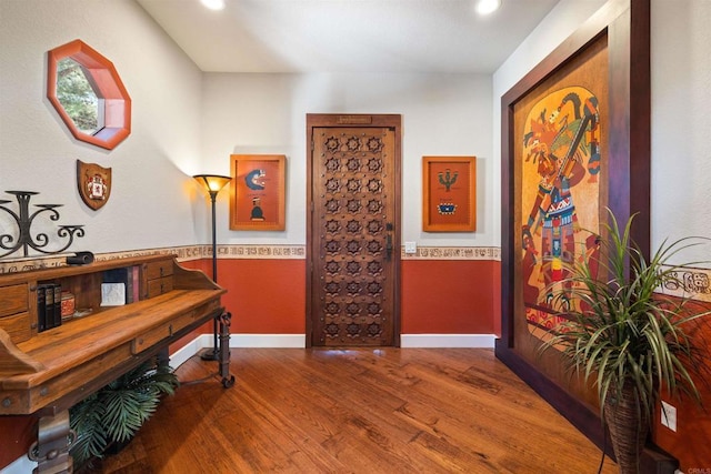 hall featuring wood-type flooring