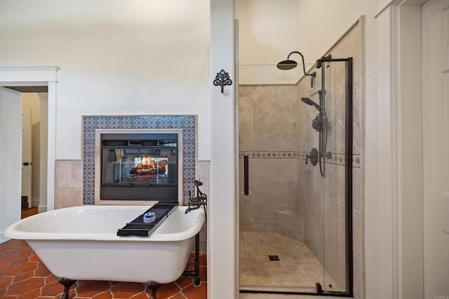 bathroom with plus walk in shower and tile patterned flooring