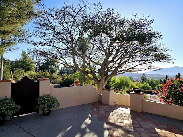 view of patio with a mountain view