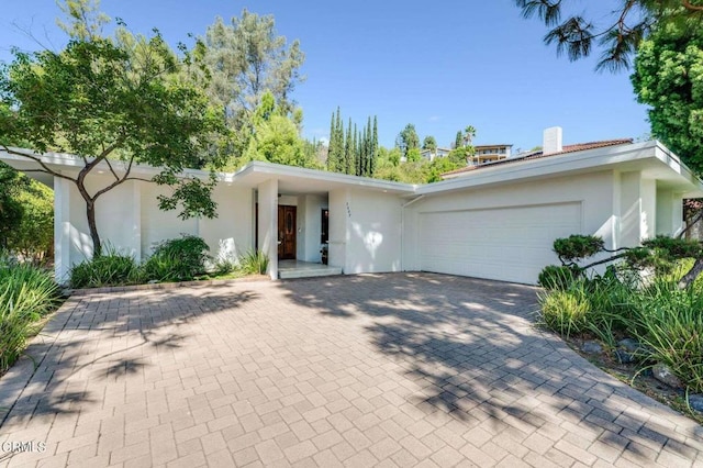 view of front of home with a garage