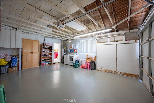 garage with washer and clothes dryer and a garage door opener