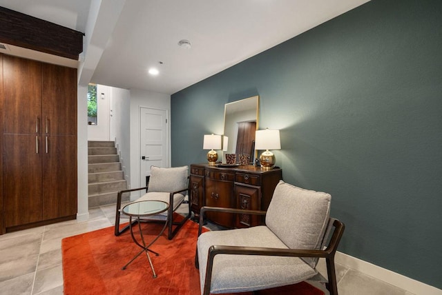 sitting room featuring light tile patterned floors