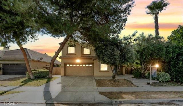 view of front of property featuring a garage