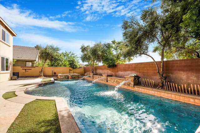 view of swimming pool featuring pool water feature