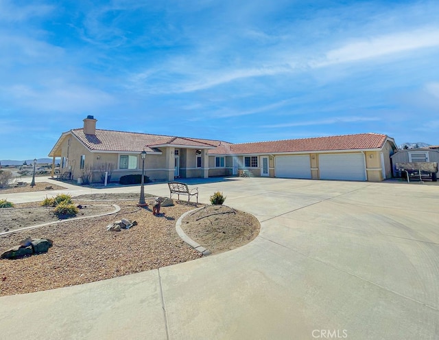 ranch-style home with a garage