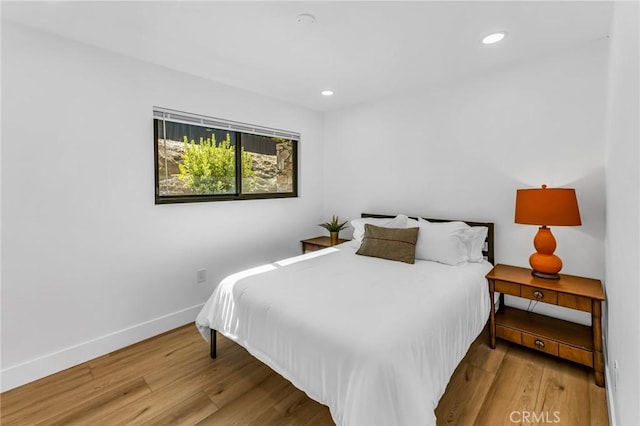 bedroom featuring hardwood / wood-style flooring