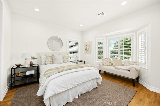 bedroom featuring hardwood / wood-style floors