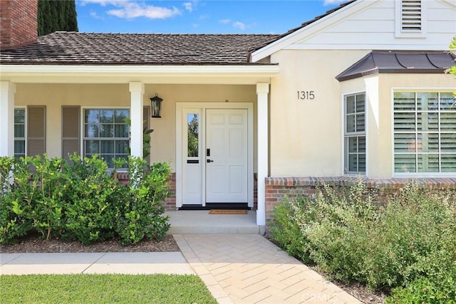 property entrance with a porch