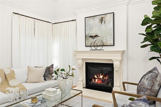 sitting room featuring crown molding