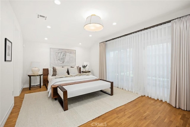 bedroom featuring wood-type flooring