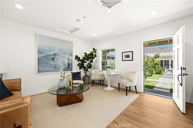 sitting room featuring hardwood / wood-style floors