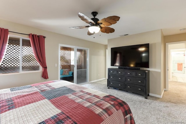 bedroom with multiple windows, access to outside, ceiling fan, and light colored carpet