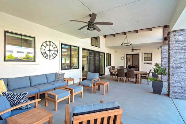 view of patio / terrace with ceiling fan and an outdoor hangout area