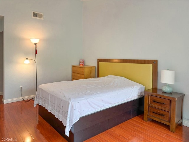 bedroom featuring light wood-type flooring