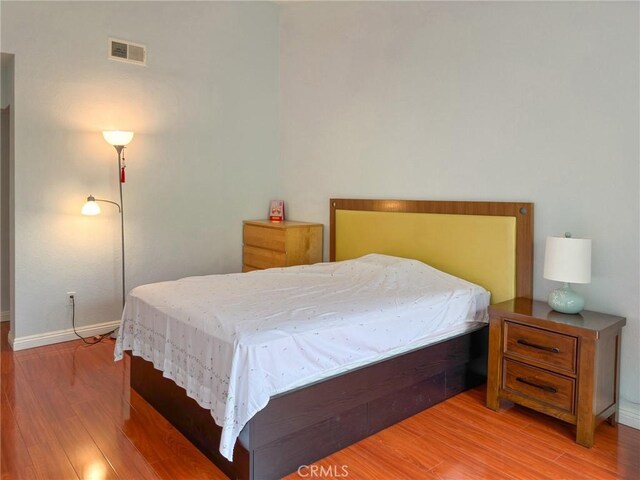 13168 Pinnacle Ct, Chino Hills, CA 91709 - bedroom with wood finished floors and baseboards