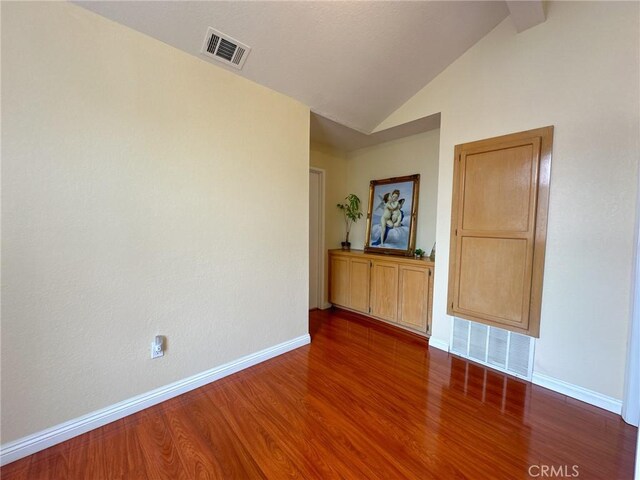 13168 Pinnacle Ct, Chino Hills, CA 91709 - empty room with wood finished floors and lofted ceiling