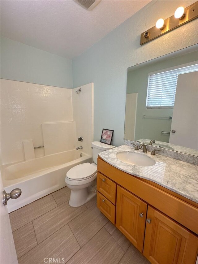 13168 Pinnacle Ct, Chino Hills, CA 91709 - bathroom with vanity, bathing tub / shower combination, and wood tiled floors