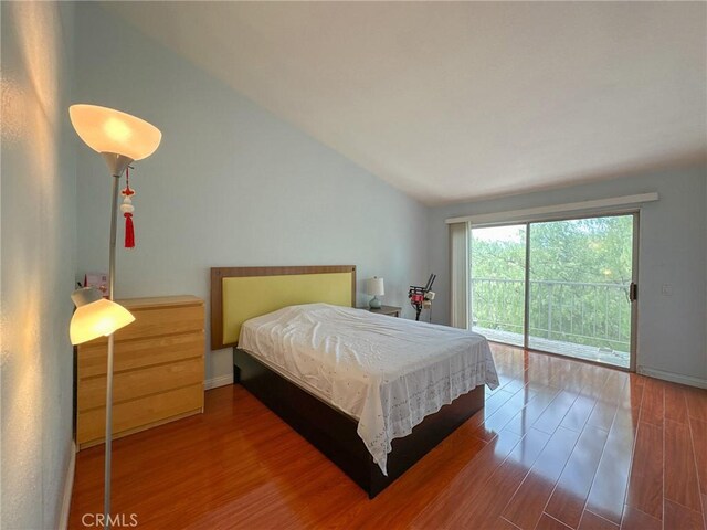 13168 Pinnacle Ct, Chino Hills, CA 91709 - bedroom featuring access to outside, wood finished floors, and lofted ceiling