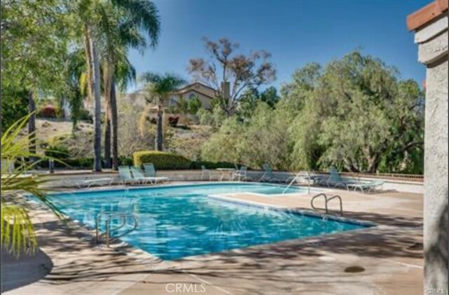 13168 Pinnacle Ct, Chino Hills, CA 91709 - community pool featuring a patio