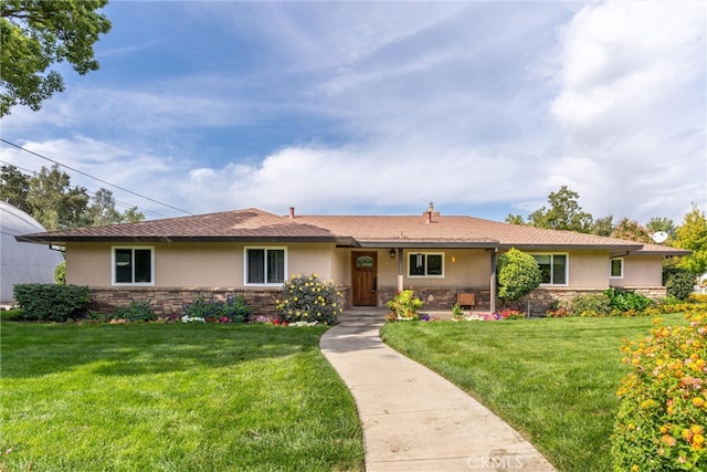 ranch-style house with a front lawn