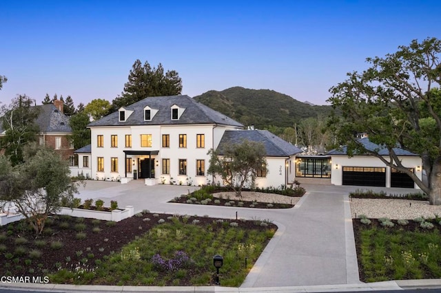 view of front of home with a mountain view