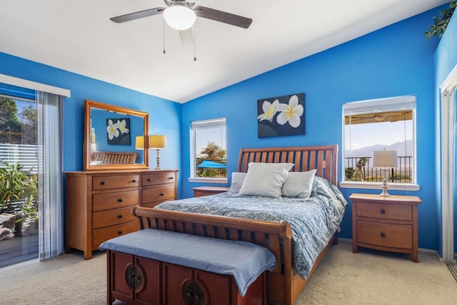 carpeted bedroom featuring ceiling fan and lofted ceiling