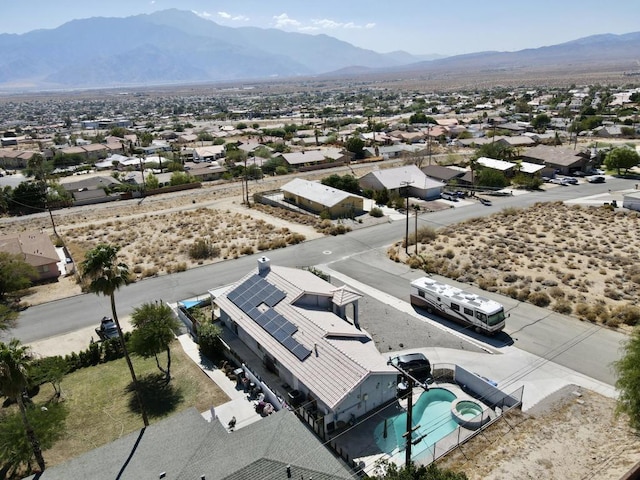 drone / aerial view featuring a mountain view