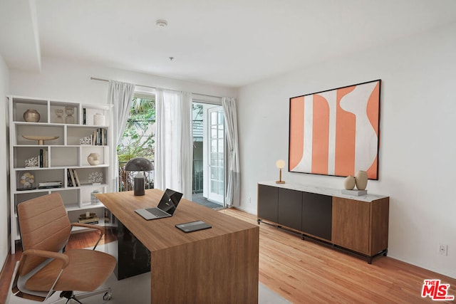 office area with light wood-type flooring