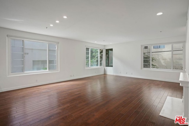 empty room featuring dark hardwood / wood-style floors