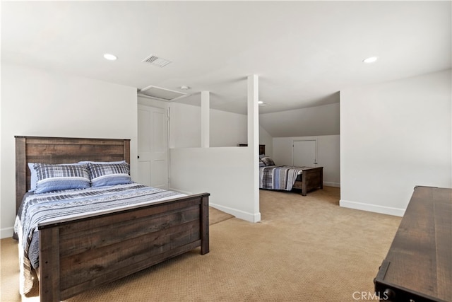 bedroom with light carpet