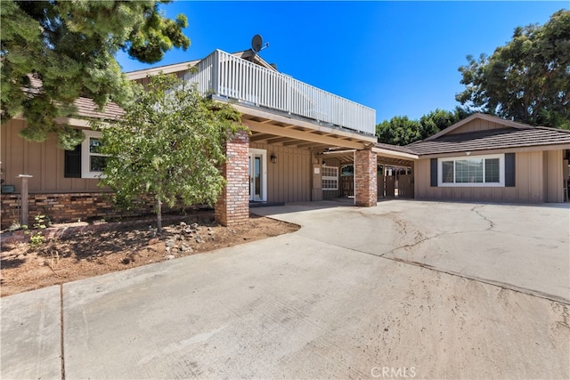 view of front of house with a carport