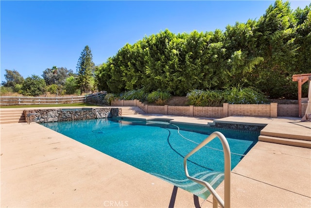 view of swimming pool featuring a patio