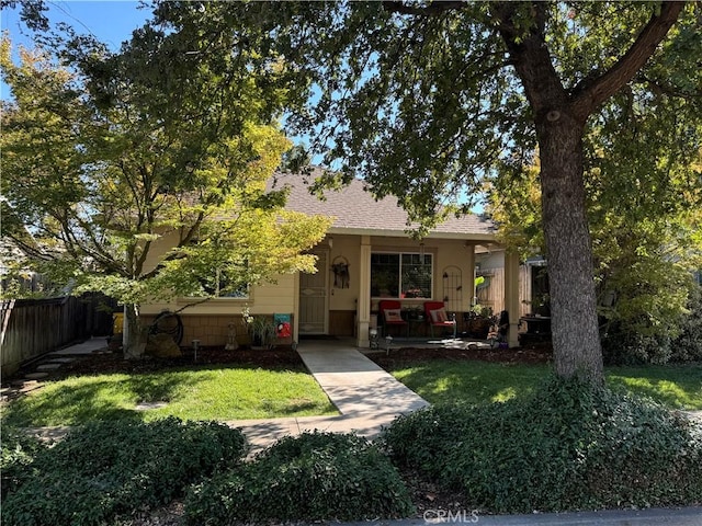 view of front of home with a front yard