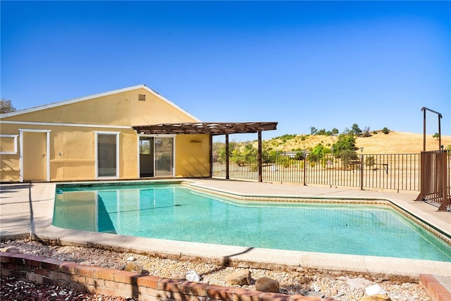 view of pool with a pergola